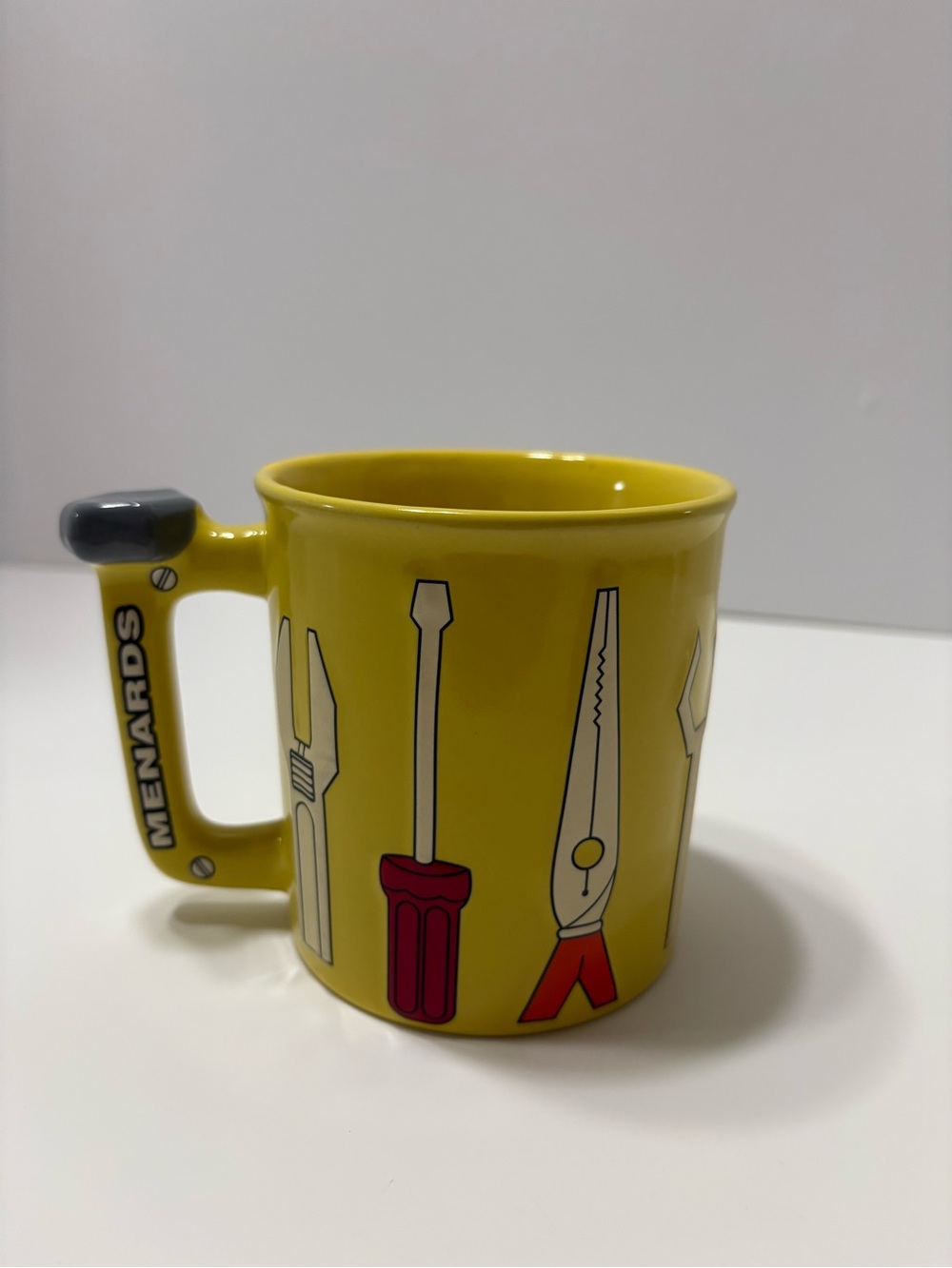 Menards Yellow Tool Graphic Ceramic Mug